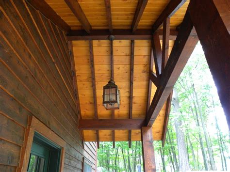 I'm installing 4 small separate light fixtures at each quarter and a ceiling fan in the center. Ceilings - Rustic - Porch - Other - by Waldmann Construction