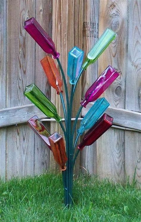 30 Amazing Wine Bottle Craft Ideas For Garden Decor Glass Garden Art Bottle Tree Bottle Crafts