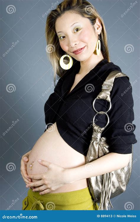 Sexy And Fit Months Pregnant Woman Covered In Blue Tulle And Looking