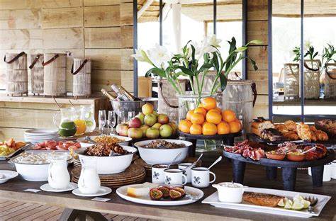 Hotel breakfast buffets are a common site in hotels around the world. Londolozi Founders Camp | Breakfast buffet table, Hotel ...