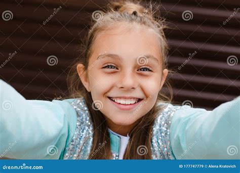 Cute Little Girl Taking A Selfie With A Mobile Phone Outdoor Stock