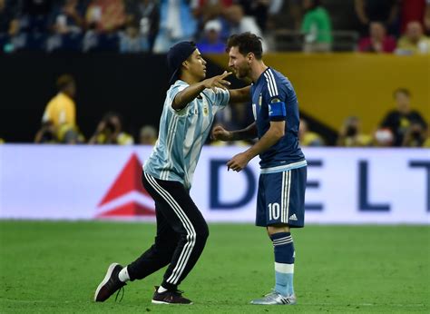 Argentina Fan Runs On The Pitch To Hug Lionel Messi Gets Jersey Signed