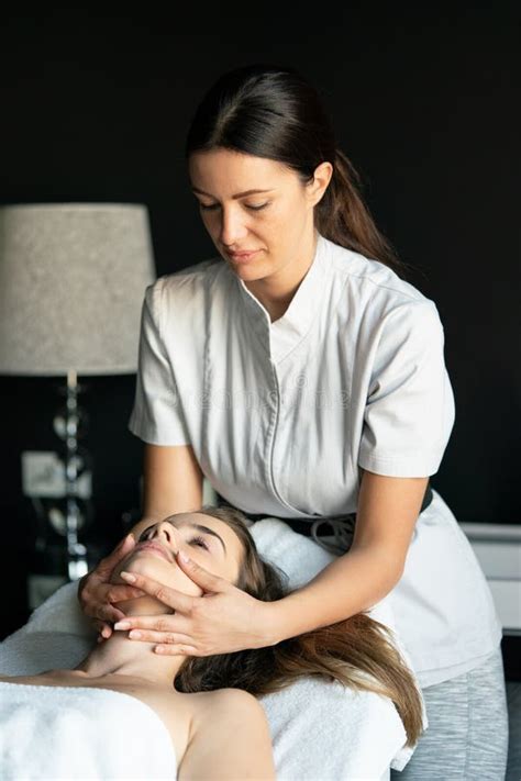 Health Beauty Resort And Relaxation Concept Beautiful Woman In Spa Salon Getting Massage
