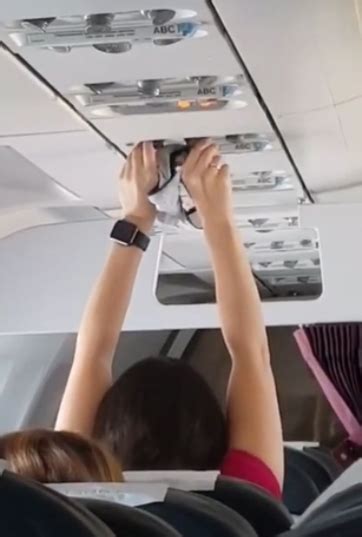 Bizarre Moment A Female Passenger Is Spotted Drying Underwear On Plane