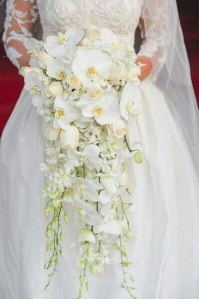 Cascading Bridal Bouquet Which Features Ivory Roses White Hyacinth