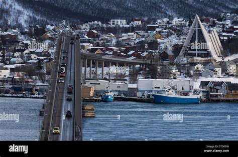 View Of The Arctic Cathedral And The Road Bridge Tromso Norway Stock