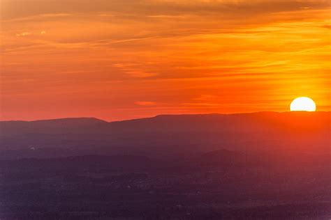 Molten Sunset Photograph By John Carroll Fine Art America