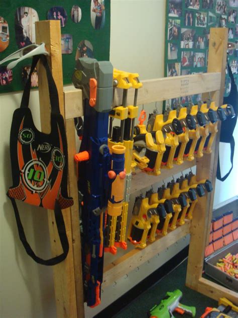 We found some ideas for nerf storage that were fun and seemed like great options and all of them here's an image to pin if you'd like to save this idea for later!: Nerf Gun Rack- Ready for a fair battle with a bunch of guys. This is sweet. | Nerf gun storage