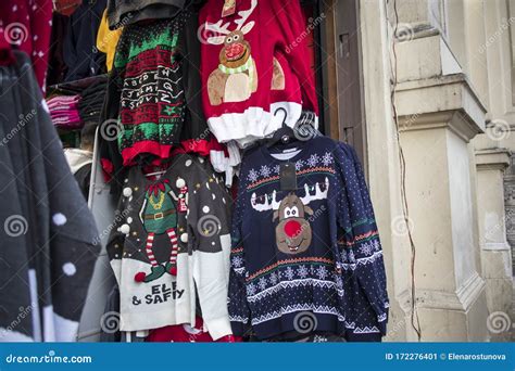 A Temporary Seasonal Display Of Ugly Christmas Sweaters At A Retail