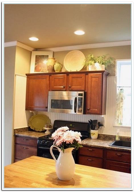 Creative Ways To Decorate Above Kitchen Cabinets Home Cabinets