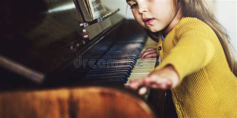 Adorable Cute Girl Playing Piano Concept Stock Photo Image Of