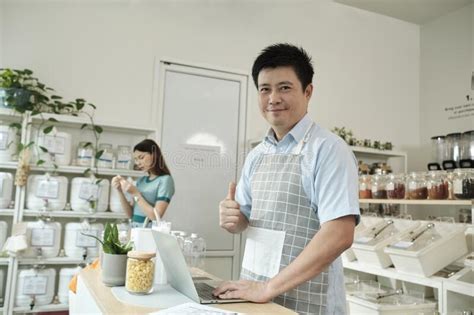 Portrait Of Asian Thai Male Shopkeeper At Refill Store Zero Waste