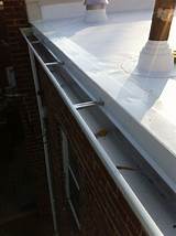 Pictures of Flat Roof Gutter Installation