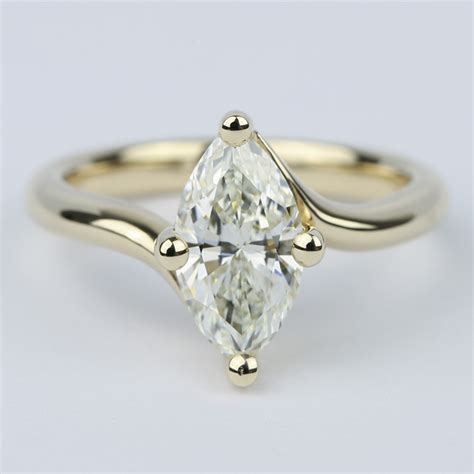 Given an engagement ring is meant to last for the long haul, it's worth noting the marquise has a history of going in and out of style. Swirl Style Marquise Diamond Engagement Ring