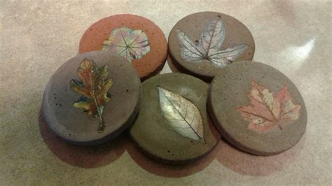 My concrete leaf cast coasters are painted with metalic paint and