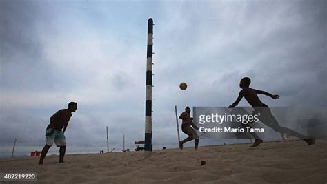 Brazilians Play Beach Volleyball On Copacabana Beach In Rio Photos And