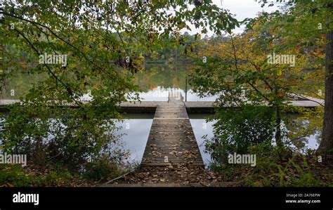 A Scenic Autumn View Of A Dock On A Lake Stock Photo Alamy