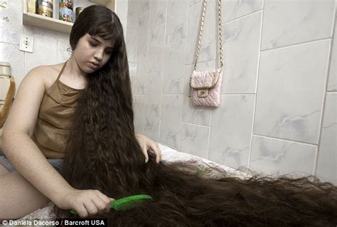 Her name is xie qiuping and the length of her hair is 5.62 m. Versatile Scoop: The Longest Hair You've EVER Seen!