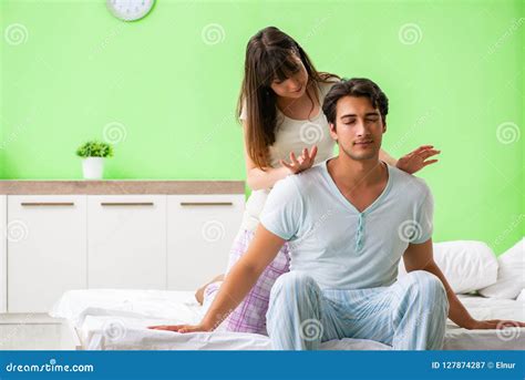 the woman doing massage to her husband in bedroom stock image image of pleasure married