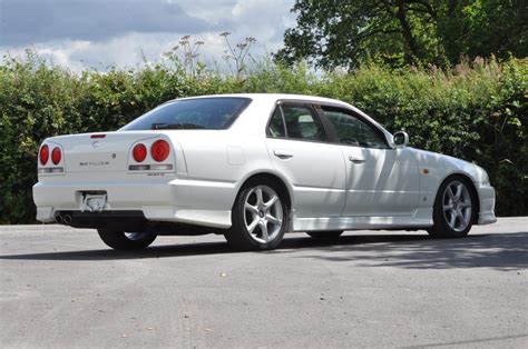 The turbo version could be 2 door or 4 door. Nissan Skyline ER34 - 4 Door - Jap Imports UK