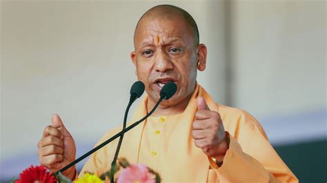 Up Cm Yogi Adityanath Holds Roadshow In Mainpuri Greeted By Supporters