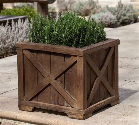 Farmhouse design is a rustic yet modern way to spruce up and home. Rustic Farmhouse Planter | Pottery Barn