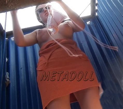 Voyeur Videos Metadoll Blog Beach Cabin A Tanned Woman