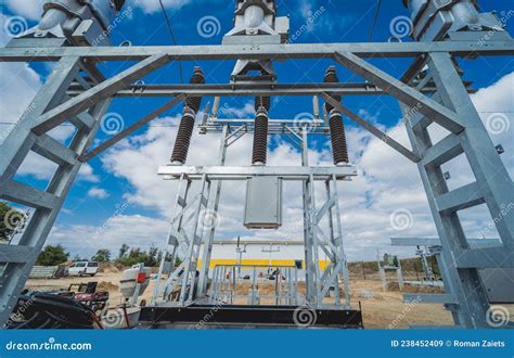 Construction Of A Power Transmission Substation On A Background Of Blue