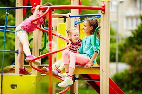 Three Girls Playing Together On Playground Royalty Free Stock Image