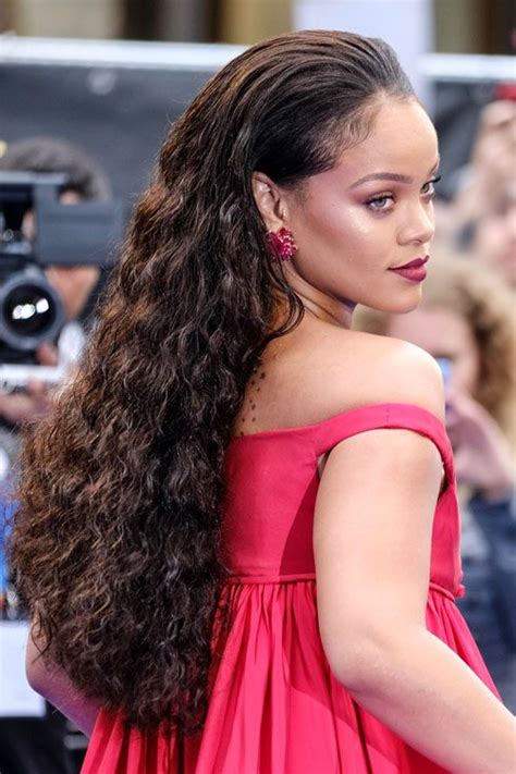 Rihanna Curly Dark Brown Bouffant Slicked Back Hairstyle Steal Her Style