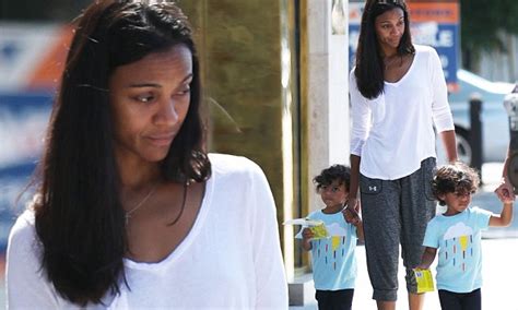 zoe saldana and husband marco take twins cy and bowie out daily mail online