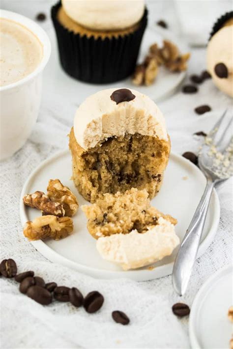 Decorate the cupcakes with whipped cream and finish with chocolate chips. Walnut and Coffee Cupcakes with Coffee Buttercream | Sugar Salt Magic