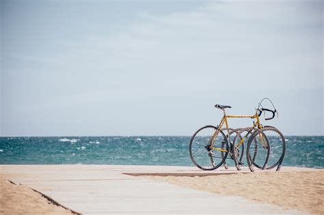 Images Gratuites Bleu Plage Ciel Mer Véhicule Roue De Bicyclette