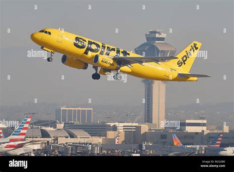 Spirit Airlines Bright Yellow Airbus A320 Taking Off From Los Angeles