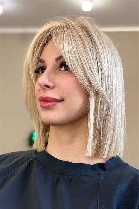 The Curtain Bangs With A Long Bob Hairstyle Is A Trendy Cut That Will