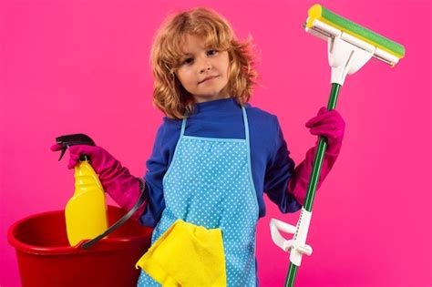 Premium Photo Child Doing Housework Studio Portrait Of Child Use