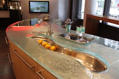 Giallo ornamental granite countertops add elegance in the kitchen. 22 Modern and Stylish Glass Kitchen Countertop Ideas ...