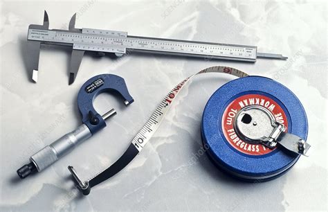 Tape Measure With Vernier Calipers And Micrometer Stock Image H305