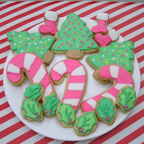 You can let your creativity shine by using fun cookie shapes, cool frosting designs, and unique sprinkles and toppers to create cookies that everyone from house guests to santa will love. I had so much fun decorating them! I was hooked. The icing was lumpy. My red was actually pink ...