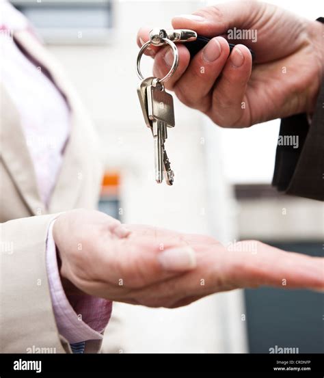 Handing Over Keys Stock Photo Alamy