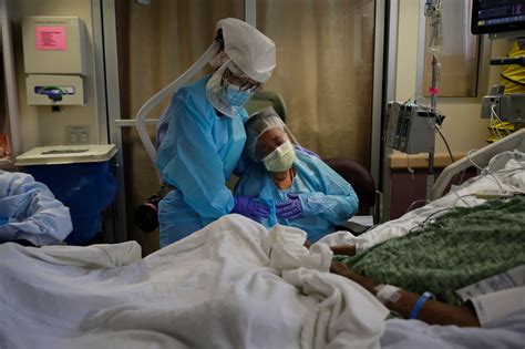 The Defining Photos Of The Pandemic — And The Stories Behind Them