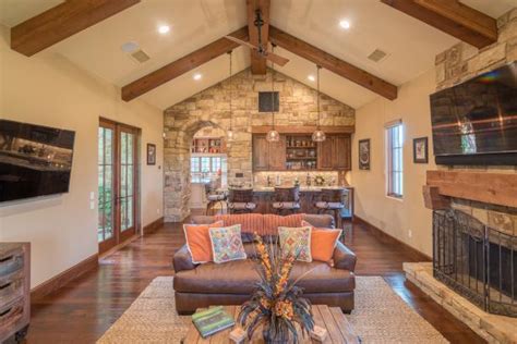 Mediterranean Open Plan Living Room With Exposed Beam ... In my opinion, a vaulted ceiling makes a room more visually interesting.