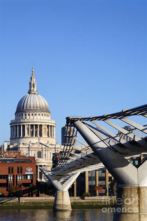 The Millenium Bridge And St Pauls Cathedral In London England