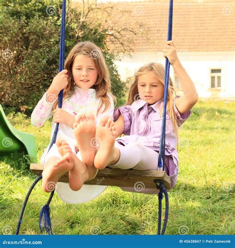 Girls Swinging On Swing Stock Image Image Of Grass Girl 45638847