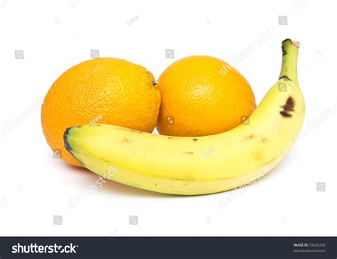 Two Oranges And Banana On White Background Stock Photo 73655230