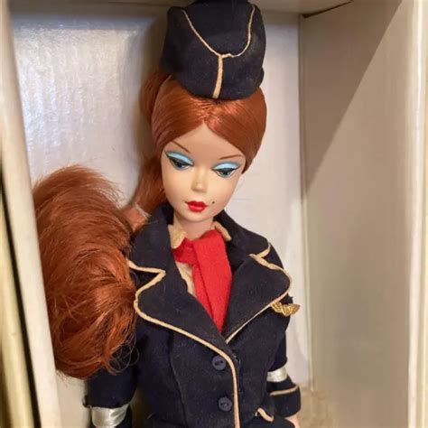MATTEL BARBIE FASHION Model Collection FMC Stewardess Doll Figure Gold