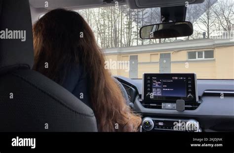 Female Driver Driving Her Car Woman Behind The Wheel Toyota Rav4