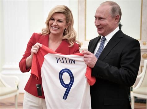 Croatian Leader Hands Putin Soccer Shirt Before World Cup Final Reuters