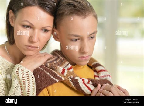 Serious Mother And Son Stock Photo Alamy