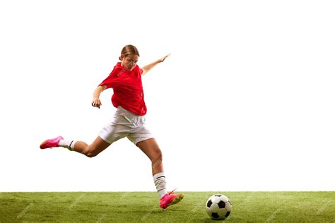 Premium Photo Young Concentrated Girl Football Player In Motion